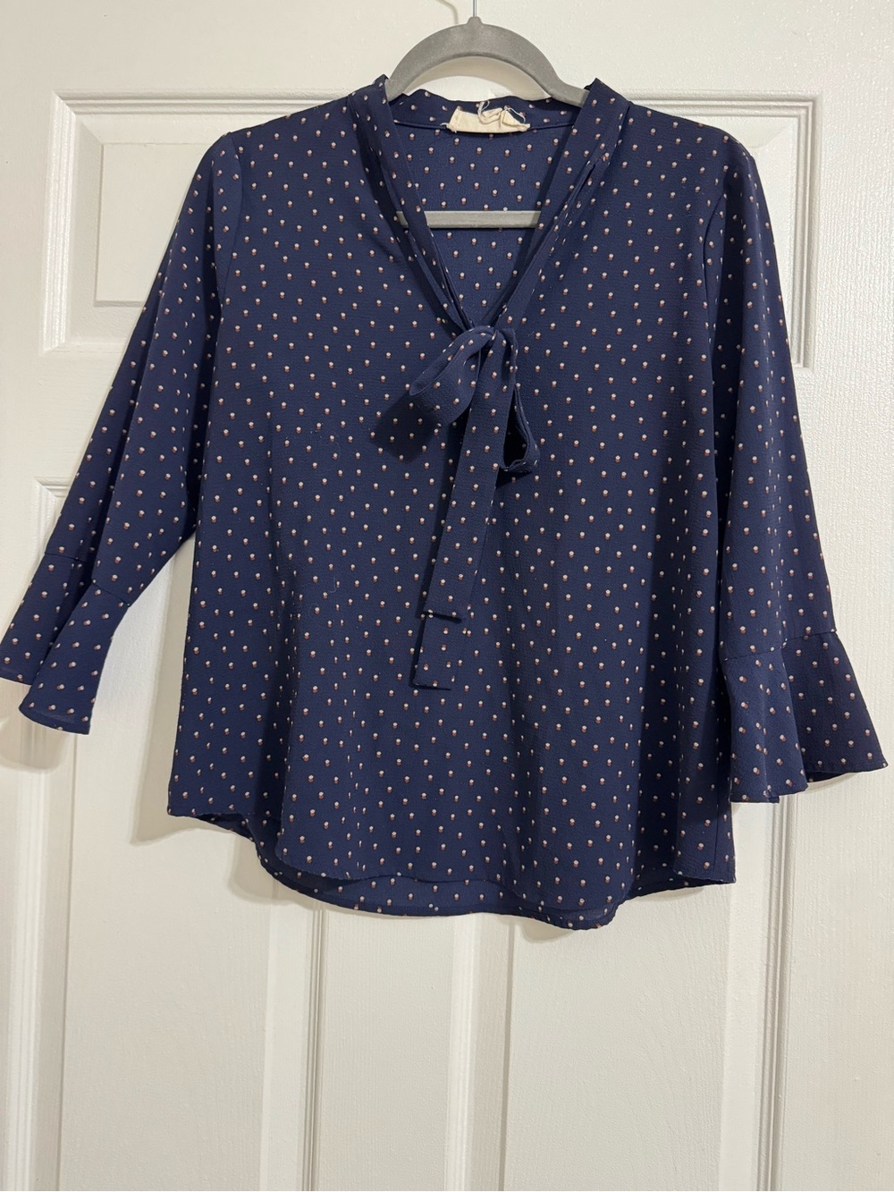 Sweet Wanderer Navy Tie-Neck Blouse with Pink Dot Accents